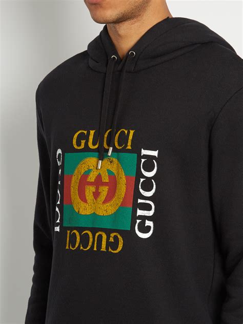 gucci logo-print hooded cotton sweatshirt|oversize sweatshirt with Gucci print.